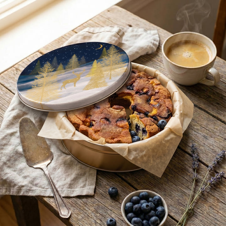 Traditional Blueberry Coffee Cake in a festive holiday Gilded Forest Gift Tin