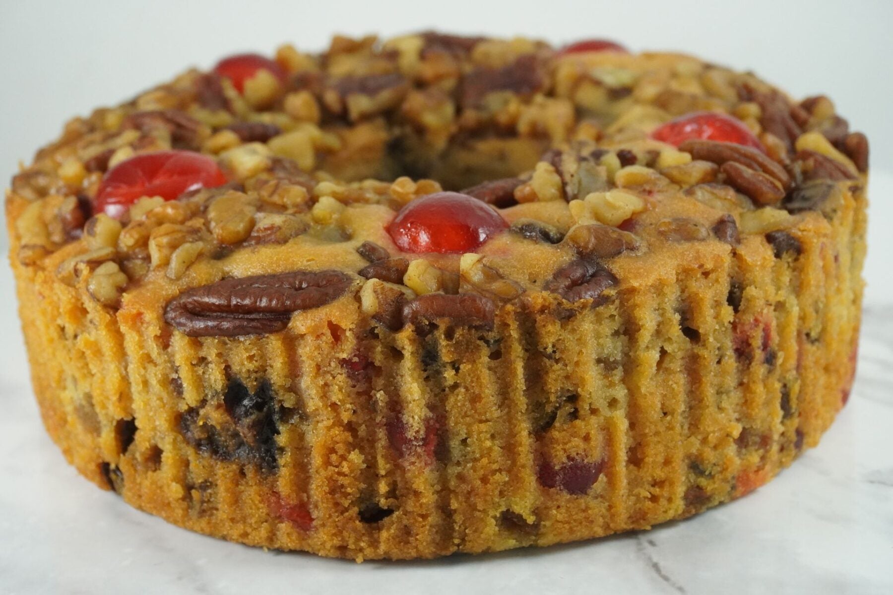 Premium Photo | Slice of delicious homemade english fruit cake loaf pudding  with dried mixed fruit, sultanas, raisins, and chopped almond. served  during christmas party or new year eve